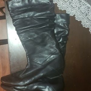 Kenneth Cole Black Leather (upper) boots.